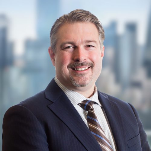 A professional photo of Jeremy Fehr, CEO of SIA Wealth